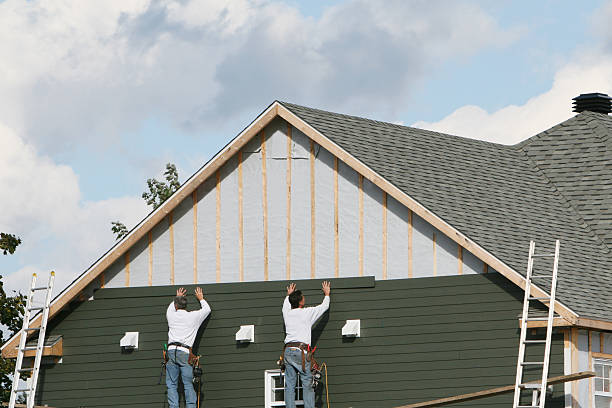 Professional Siding technician working in Reading, OH